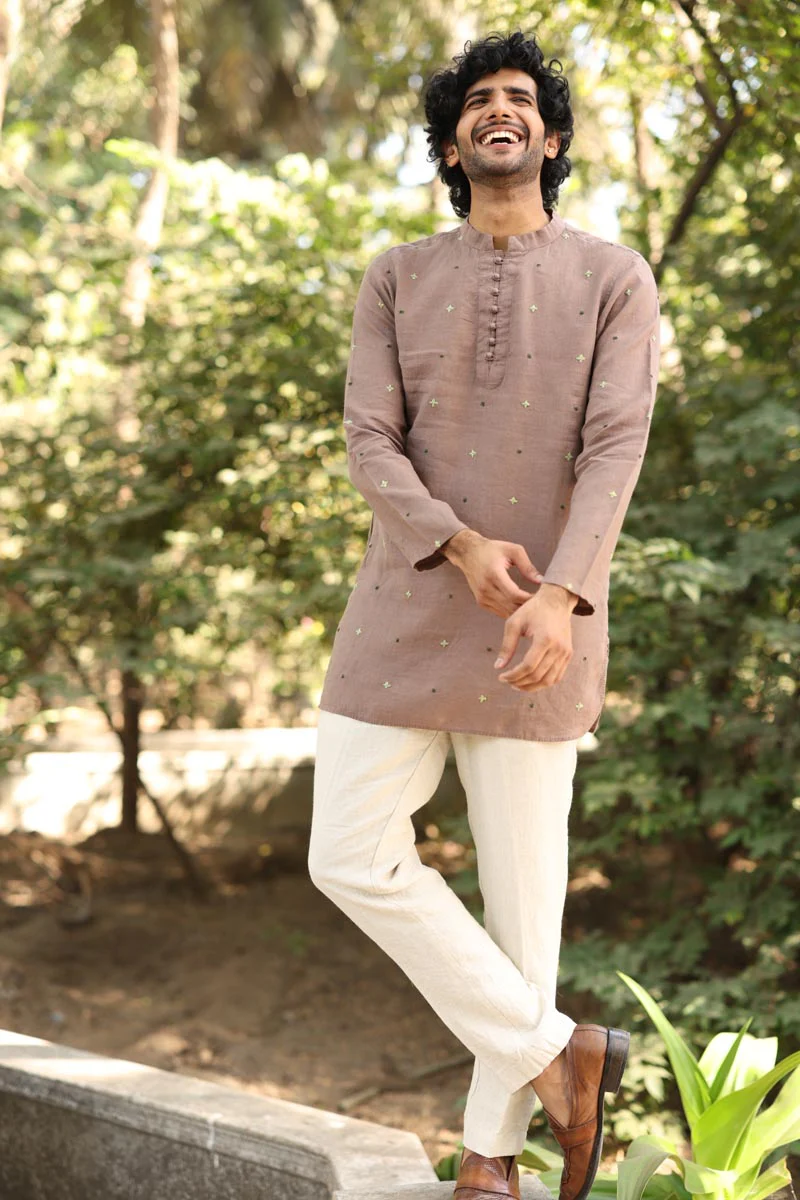 Embroidered kurta with cream trousers
